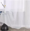 Fehér voile függöny anyaga közelről