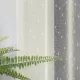 Függöny méteráru Ekrü hópehely minta 290cm magas Krém