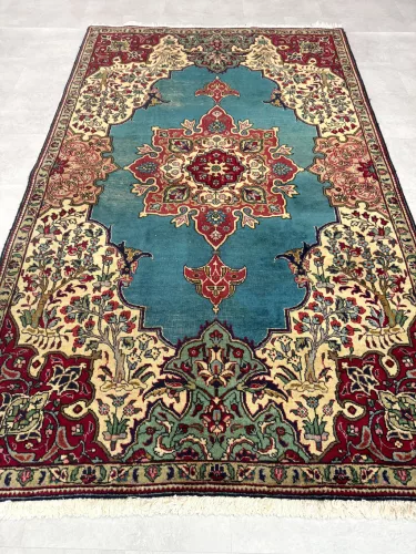 Kézi csomózású perzsa Tabriz Türkiz-kékes szőnyeg 245x150cm