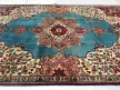Kézi csomózású perzsa Tabriz Türkiz-kékes szőnyeg 245x150cm