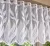 Fehér leveles mintás jacquard 55 cm magas vitrázs függöny méterben