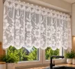 Klemátisz fehér virág mintás jacquard 40 cm magas vitrázs függöny méterben